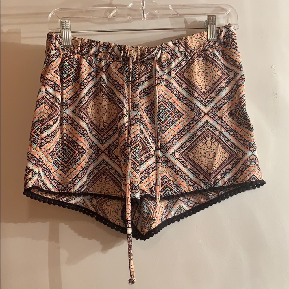 Pink and black patterned shorts